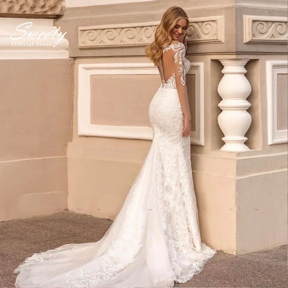 Lace Mermaid Wedding Dress with Detachable Ruffle Skirt - Button-Up Back, Long Sleeve 2-Piece Bridal Gown with Beading Detail